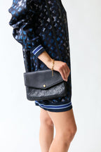 Cartera cuadrada negra | Louis Vuitton