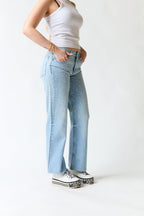 Pantalón denim con perlas | Zara