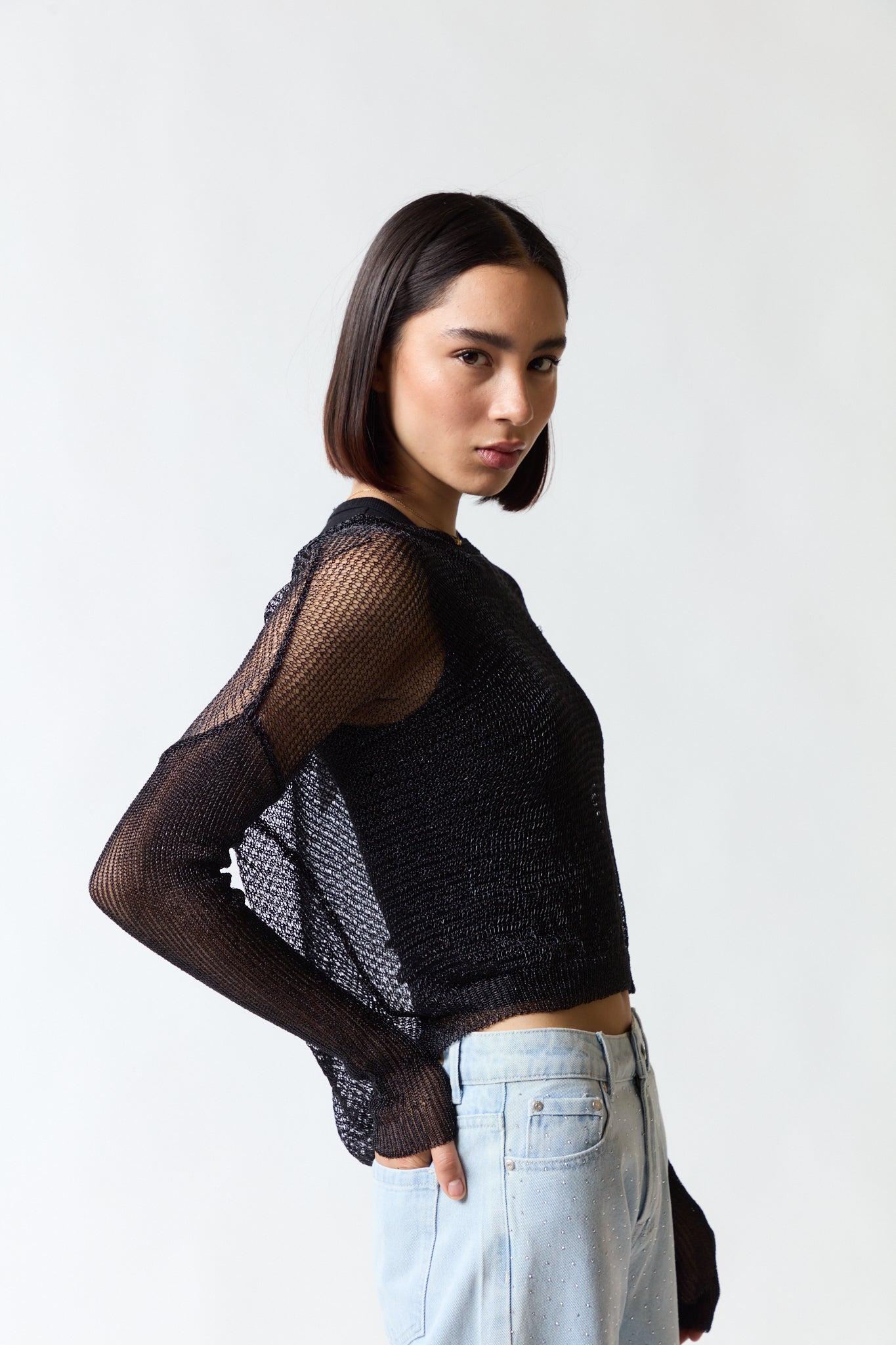 Polera malla negra | Umbrale