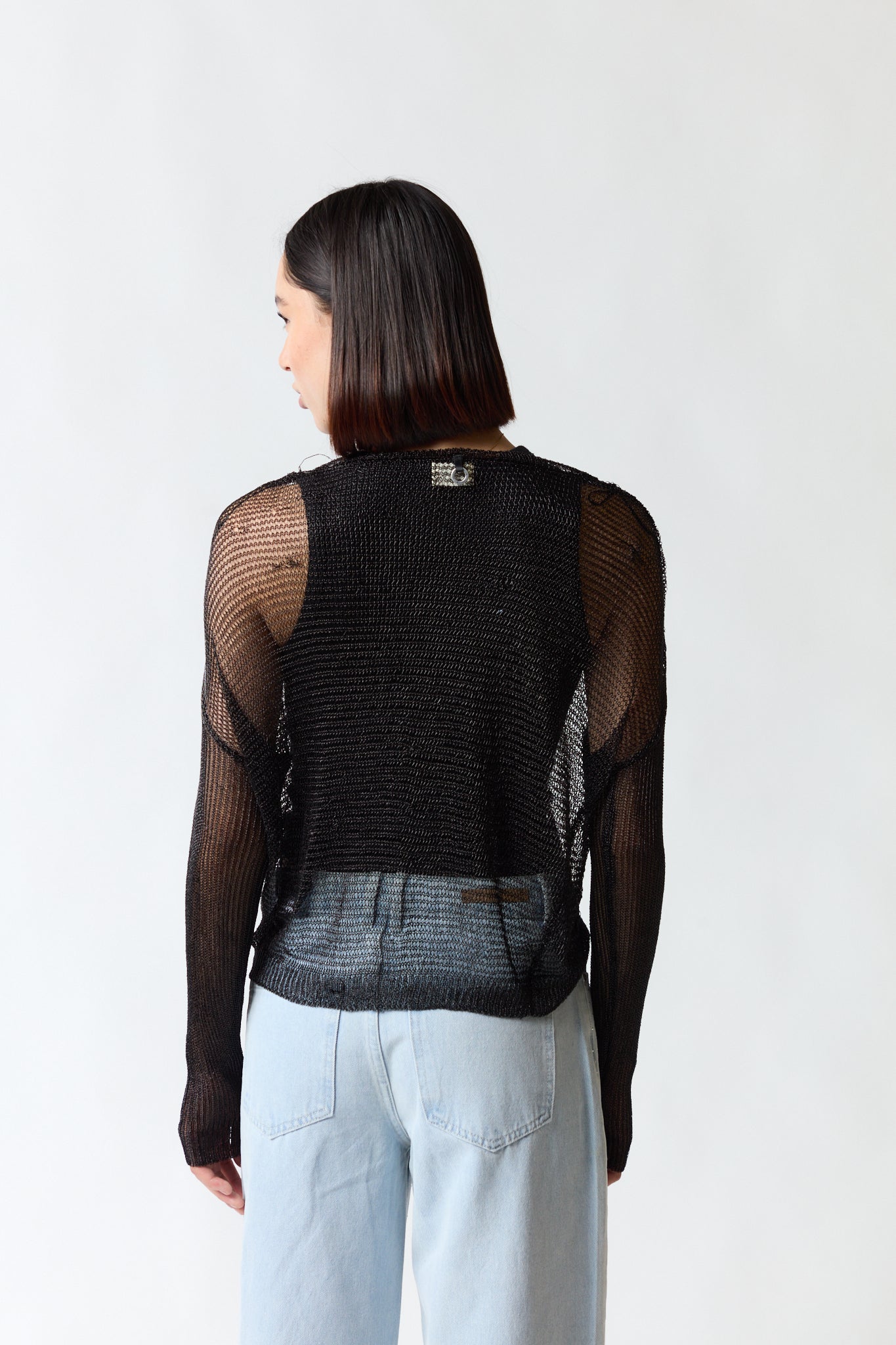 Polera malla negra | Umbrale