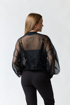 Polera transparente negra | Zara