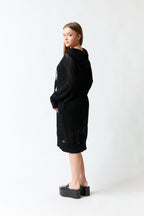 Vestido transparente negro con gorro | Zara